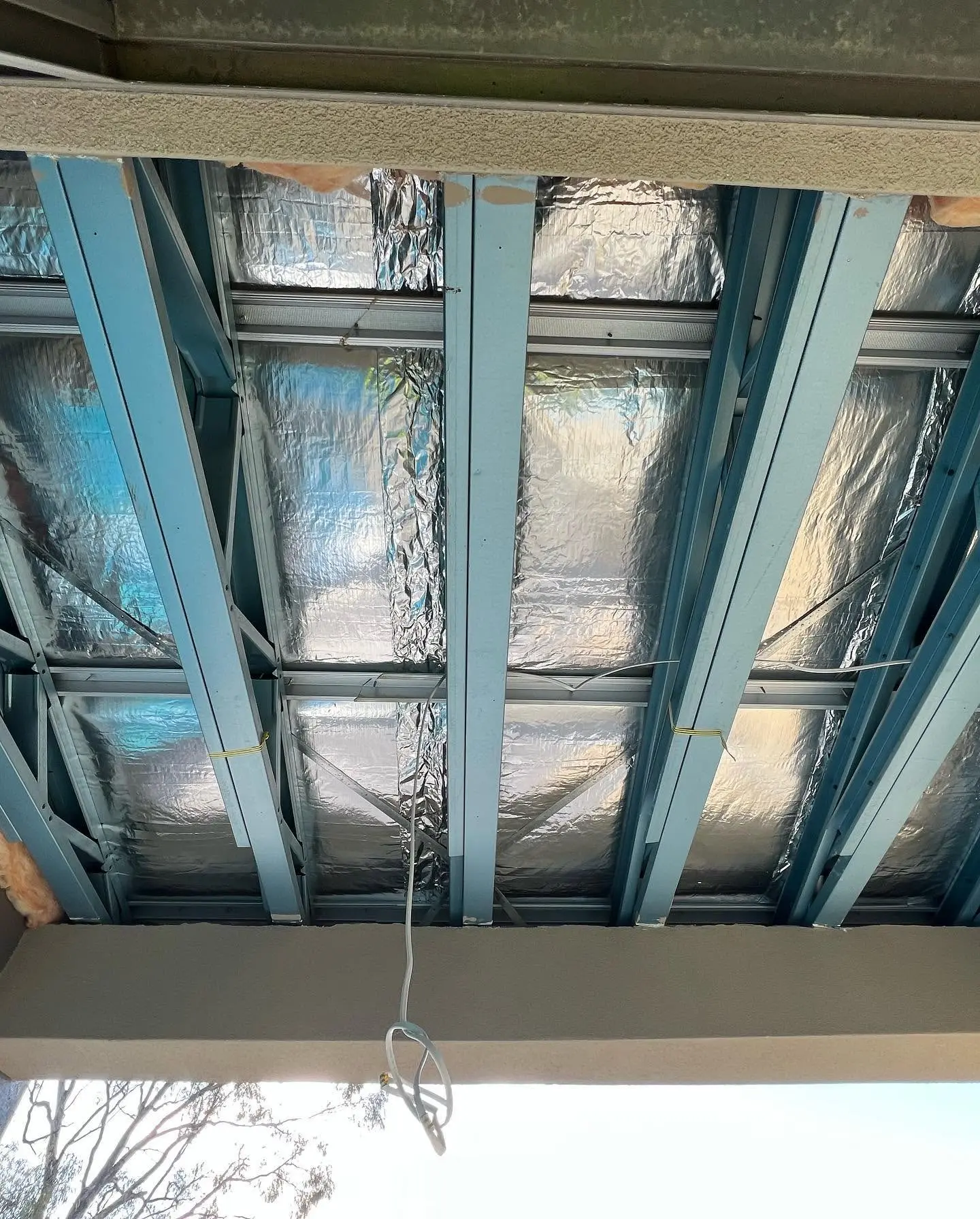 Bare steel eave frame before soffit lining