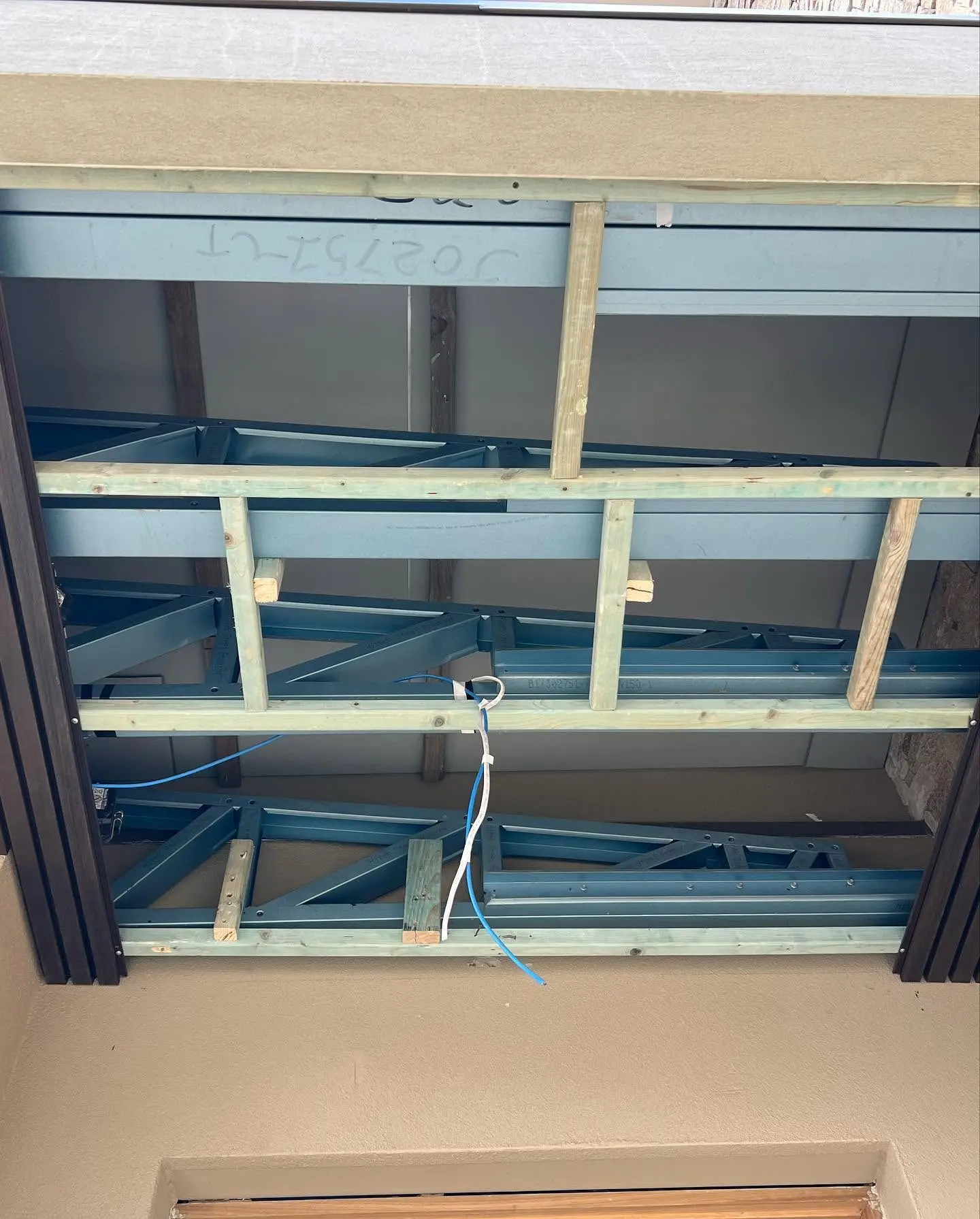 Steel eave frame ready for timber battens
