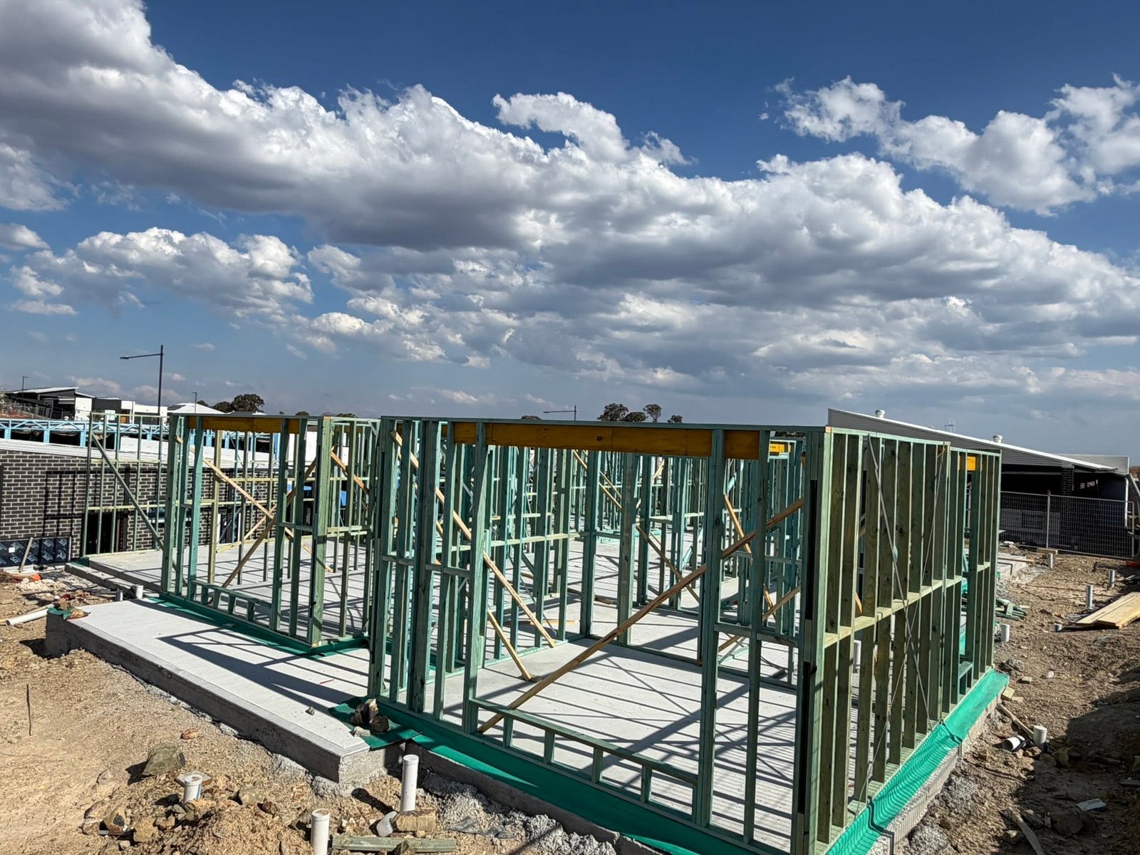 Long view of wall framing on site